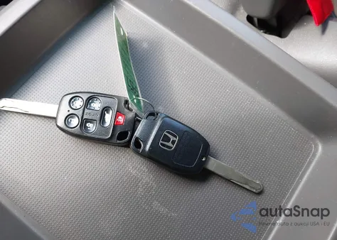 2012 Honda Odyssey Ex-L z USA, uszkodzony, nr VIN 5FNRL5H69CB097094